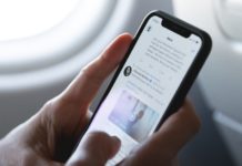 person holding space gray iPhone X